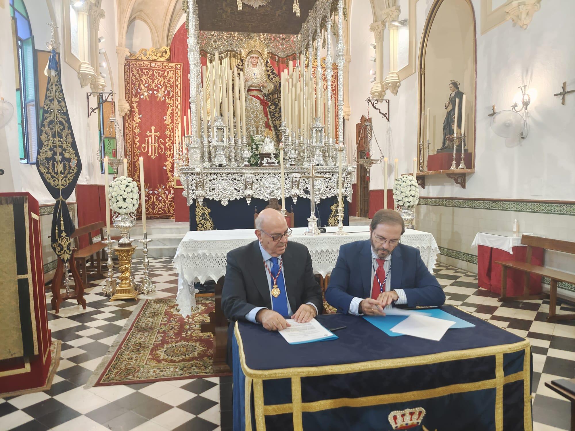 Borriquita y Cena firman la cesión del palio de la Virgen de la Paz